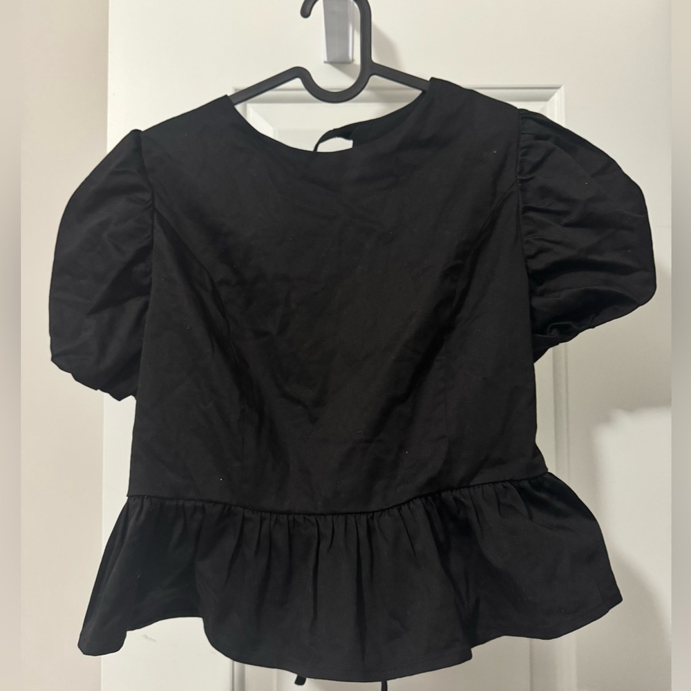 Forever 21 new with tag. Peplum top. Medium